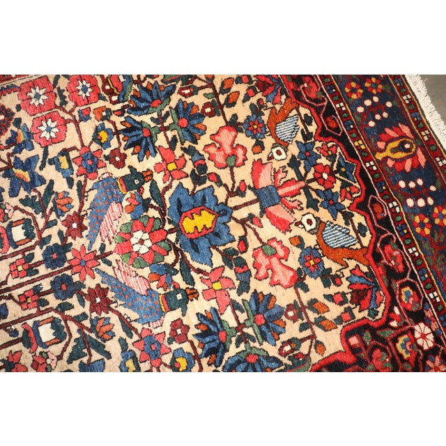 a 2nd quarter of the 20th century accent size jewel color Persian Bakhtiari Rug 4'9'' x 6'10''