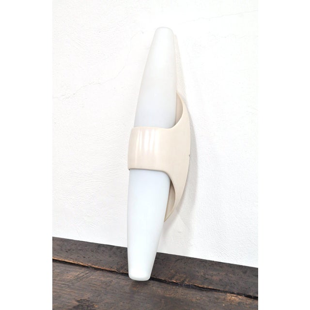 Beautiful, bauhaus-inspired wall lamps from the 1960s, designed and produced by the belgian company bo-niko. The large,...