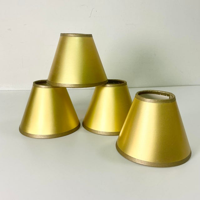 A lovely set of dramatic golden metallic Chandelier Lamp Shades. These are from the 1980s and have very little wear as...