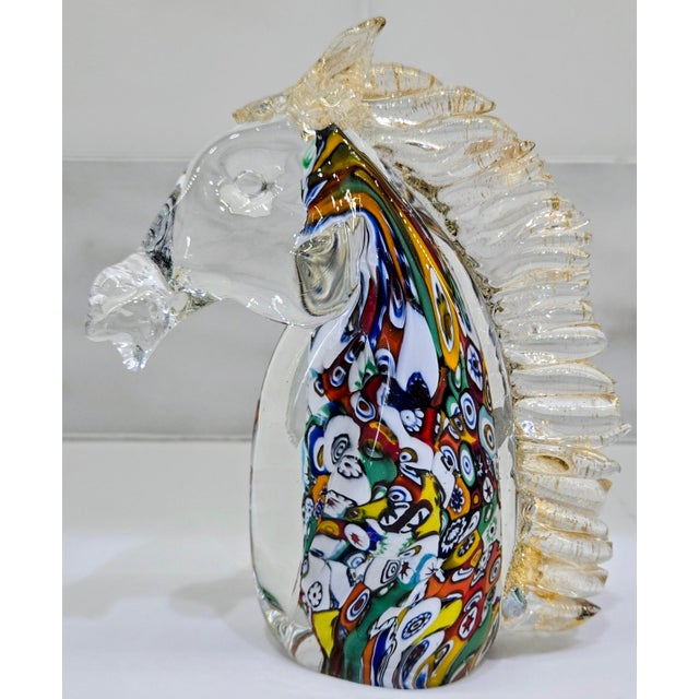 Celebrate iconic Italian art glass with this signed Murano horse head sculpture by Serenella, featuring vibrant millefiori...