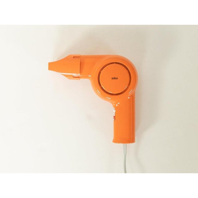 Braun HLD 6 hair dryer, space-age blow dryer accomplished design: perfect proportions and visible attention to...