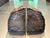 A stunning, heavy pair of vintage mid-century bookends crafted from a single piece of genuine petrified wood. Expertly...