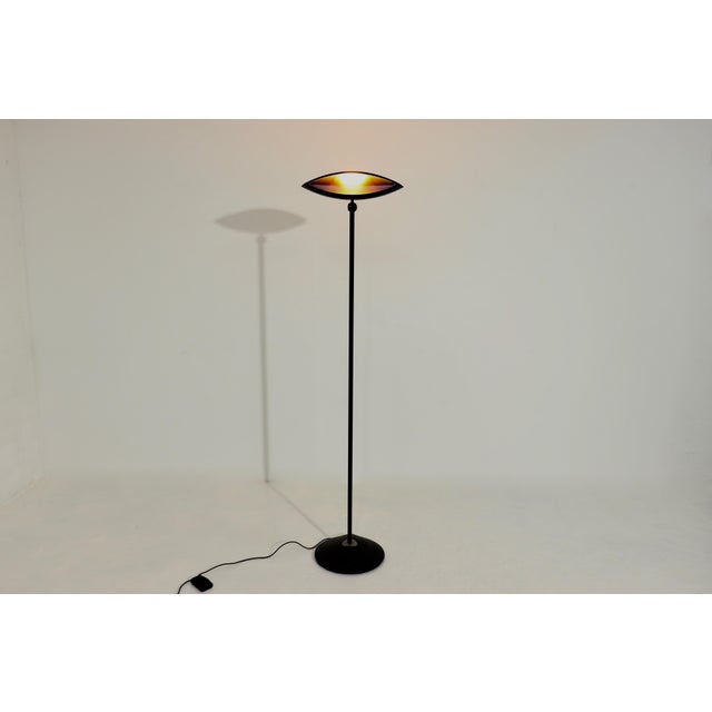 Floor lamp model Aeto designed by Fabio Lombardo for Flos Italy in the 1980s. This well designed classic has the shape of...