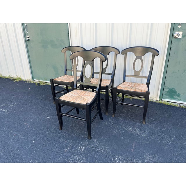 The “Napoleon” chair by Pottery Barn. This set of 4 dining chairs from Pottery Barn and made in Italy are fantastic pieces...