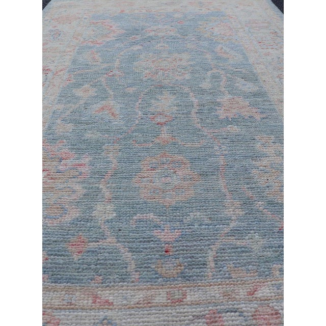 Early 21st Century Modern Oushak Rug With a Light Blue Field With All-Over Floral Motifs With Cream For Sale - Image 5 of 9