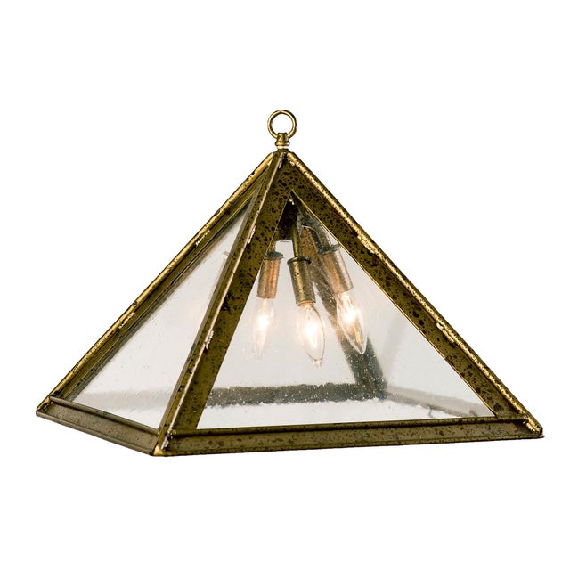 The Inverted Pyramid Pendant with seeded glass was derived from the Inverted Pyramid Chandelier. The creative inspiration...