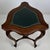 A distinctive and finely crafted 20th-century Victorian style side table, beautifully constructed in mahogany and...