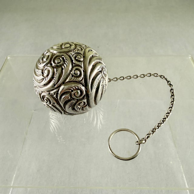 An American sterling silver tea ball infuser, showing the makers mark for Webster Sterling, circa early 1900s. Webster...