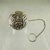 An American sterling silver tea ball infuser, showing the makers mark for Webster Sterling, circa early 1900s. Webster...