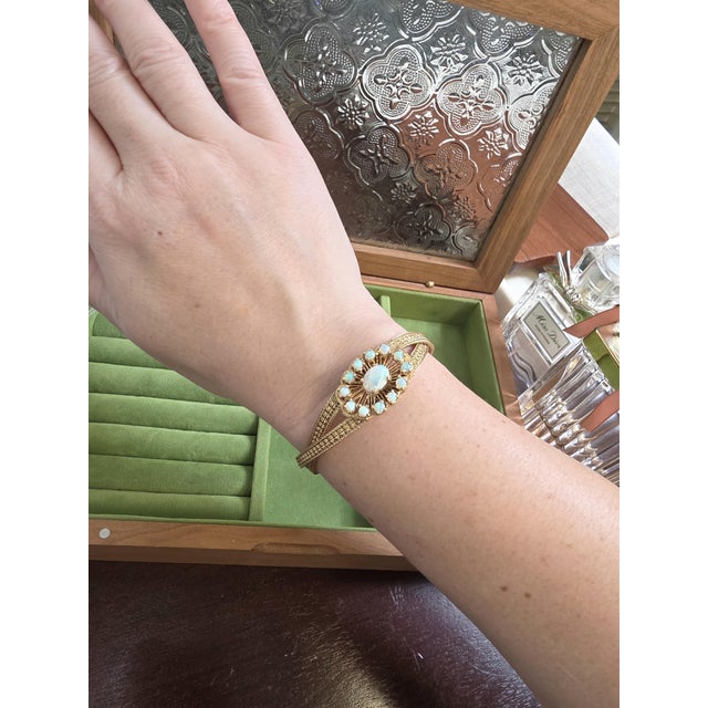 Vintage 14K Gold Australian Opal Bracelet Circa 1970s One vintage bracelet crafted in 14K gold and features Australian...