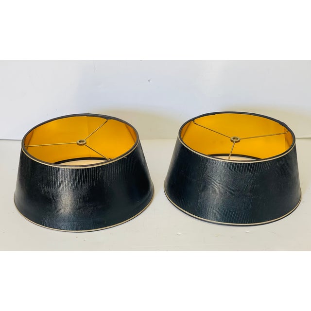 Faux leather gold snide pair lamp shades. 12” by 14” , 7” high.