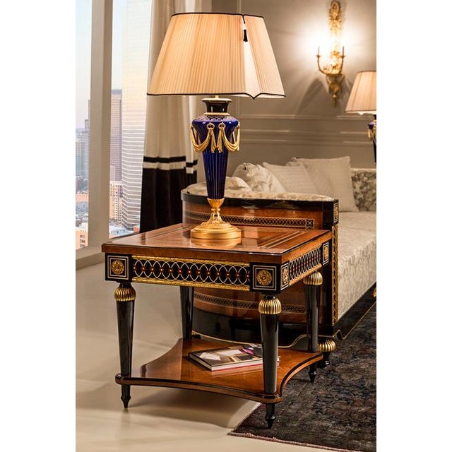 Handcrafted in Spain, this square side table features oak burl veneer with decorative inlay details and a high-gloss...
