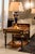 Handcrafted in Spain, this square side table features oak burl veneer with decorative inlay details and a high-gloss...