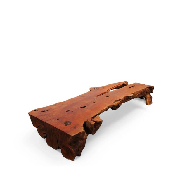 This handsome coffee table is handcrafted from a single slab of lychee burl and features stunning live edges. The top is...