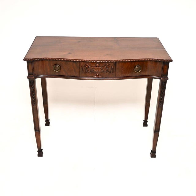 A superb antique Edwardian console table by Maple and Co. This was made in England, it dates from around the 1900-1910...