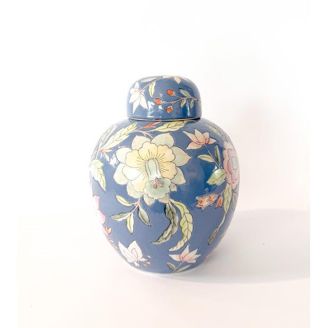 Add a touch of timeless Chinoiserie elegance to your home with this stunning vintage ceramic ginger jar. Hand-painted in...