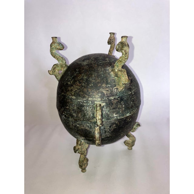 This bronze spherical footed food container adds traditional, visual, and spatial appeal to an interior. Even oxidation of...
