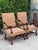 Vintage Baroque-style carved armchairs with beautifully detailed carved wood frames and an elegant, timeworn character....