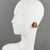 Richard Kerr designed those lovely statement clip-on earrings in the 1980s. The brand signature rhinestone paved design...