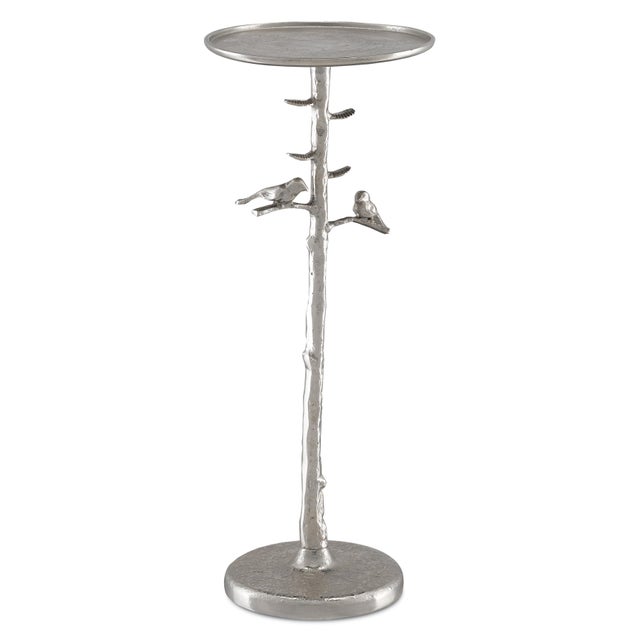 The Piaf Silver Drinks Table is a cast aluminum accent table in a luminous polished nickel finish that will make it gleam...