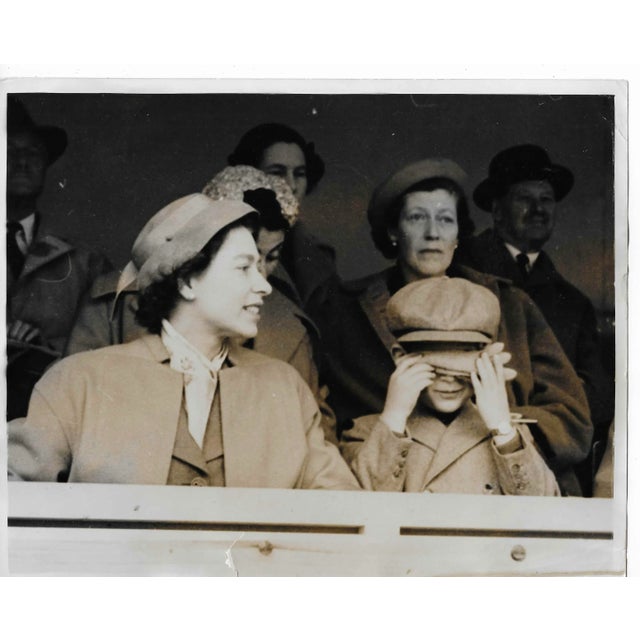 1955 photo of Queen Elizabeth II and King Charles III at the European Horse Trials. Publication information on the back.