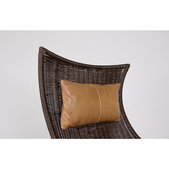 Large swivel wicker armchair, designed by Gerard Van Den Berg for Montis in the 1970s. The cushions are original and, like...