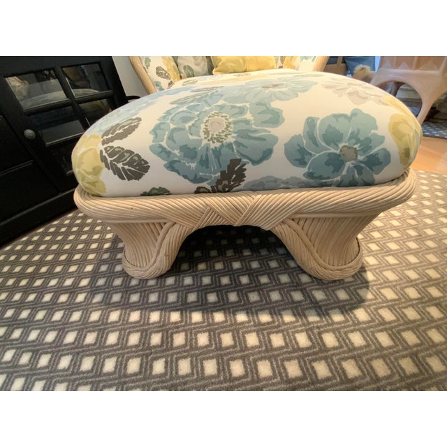 20th Century Upholstered Rattan Club Chair and Ottoman, Upholstered in a floral pattern. No makers marks or labels, in the...