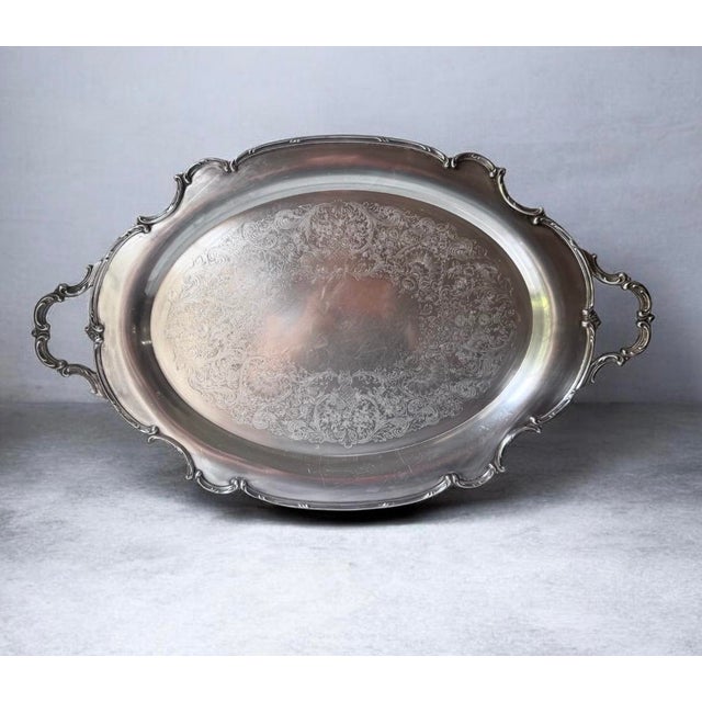 vintage 1847 Rogers Bros "Reflection" pattern silverplate waiter tray.Maker's Mark BreakdownReflection: The specific mid-...