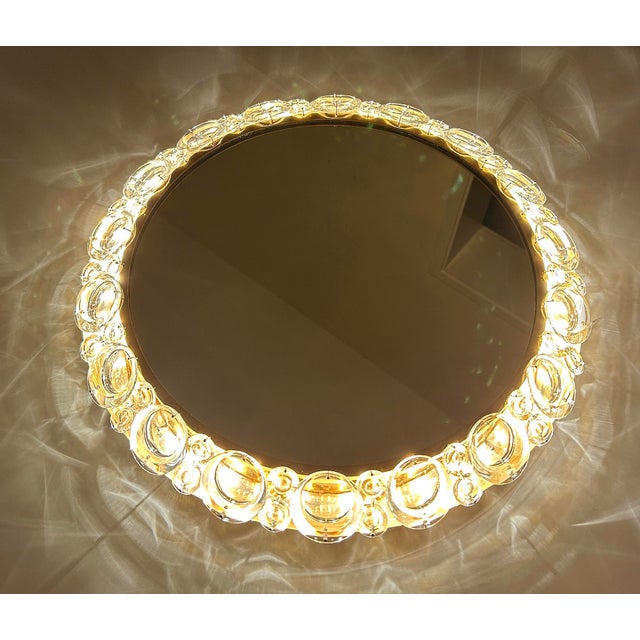 Vintage Back Lit wall-mounted mirror by Palwa featuring rows of cabochon style crystals, large and small in duo packages...