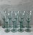 Set of 9 hand blown Verde Green glass goblets made in Spain by La Mediterranea. Goblets have a classic stemmed design and...