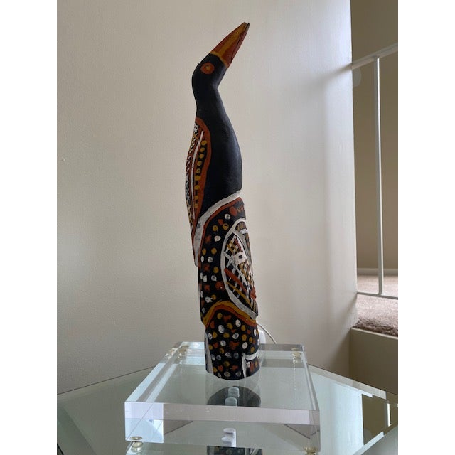 This RARE vintage hand-carved wood Tiwi Birds and Spirits sculpture from 1979 features a medium/tall size figurine...