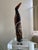 This RARE vintage hand-carved wood Tiwi Birds and Spirits sculpture from 1979 features a medium/tall size figurine...