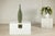 This tall artisan ceramic vase features an elegant elongated silhouette with a gently rounded body that tapers into a...