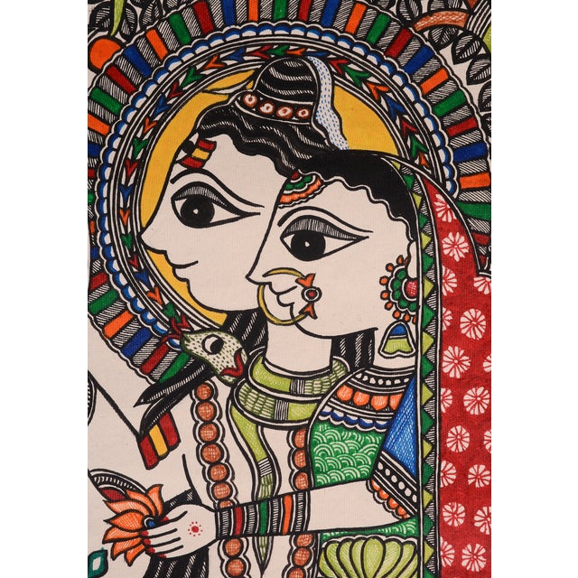 This exquisite hand-painted Madhubani painting by Mamta Devi, National Award winner in 2016, depicts Lord Shiva and...