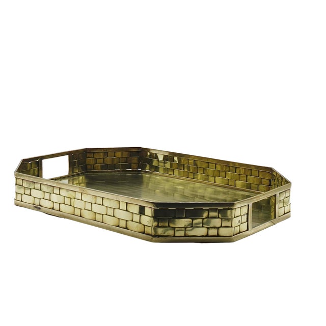 Characterised by an original octagonal/contoured shape and a perforated rim featuring a ‘basket weave’ pattern, this piece...