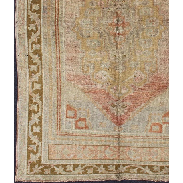 Tribal Vintage Turkish Oushak With Large Central Medallion in Cream, Yellow, Brown and Red 3'7"x5'8" For Sale - Image 3 of 10
