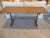 Vintage wood butcher block console with rounded edges and a natural finish. Top measures 1.5" thick.