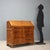 Early 20th-century style bureau crafted from fine walnut wood with elegant cherry inlays. The slightly curved front adds...