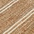Hand woven natural jute rug with ivory striped detail. Please note that its appearance may vary depending on lighting...