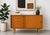 Mid Century Modern Danish sideboard by Domino Møbler, crafted in beautifully figured oak with lovely wood grain and clean...