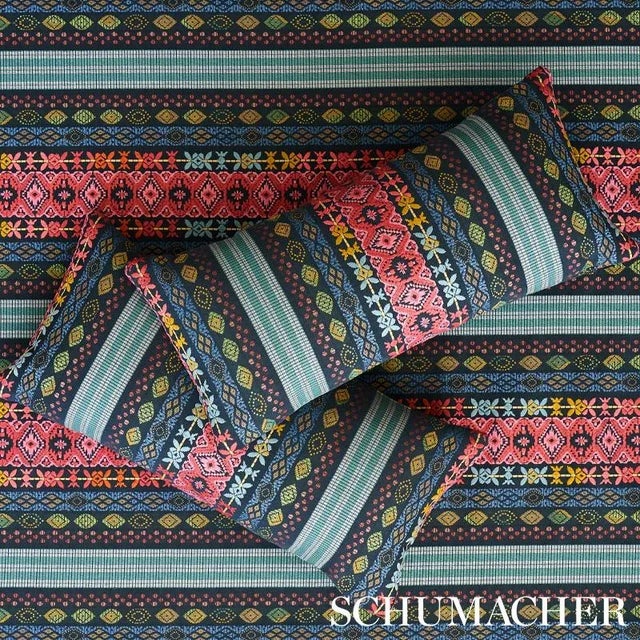 Motifs that are woven and then embroidered give this elaborate, multicolored vertical stripe the look of an authentic...