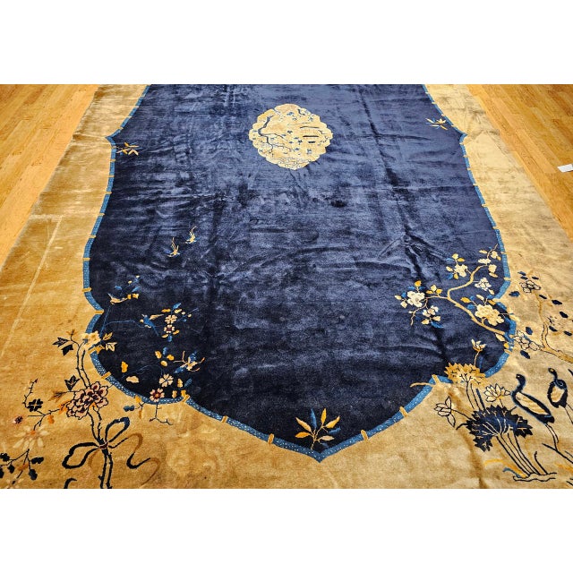 Strikingly simple and extraordinarily beautiful, this early 20th century Chinese Art Deco rug in a rare oversized format...