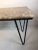 Mid 20th century marble top coffee table paired with classic hairpin wrought iron legs. Please note the marble top is very...