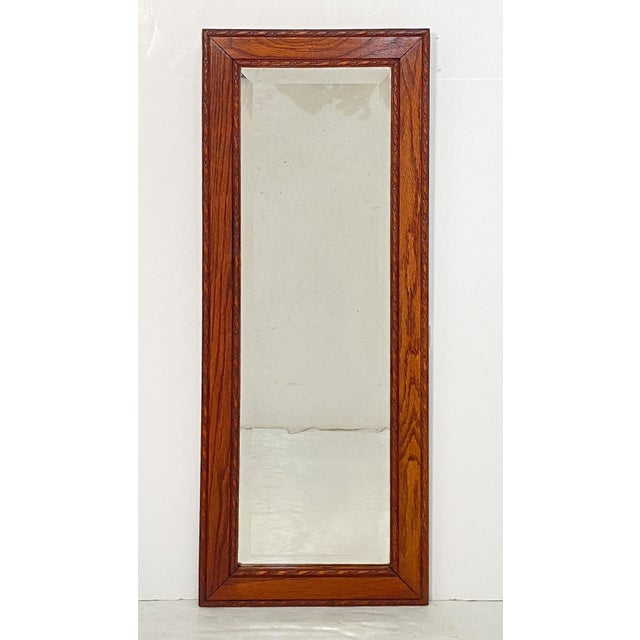 A fine English rectangular framed wall or parlour mirror from the late 19th century, featuring a beveled glass mirror...