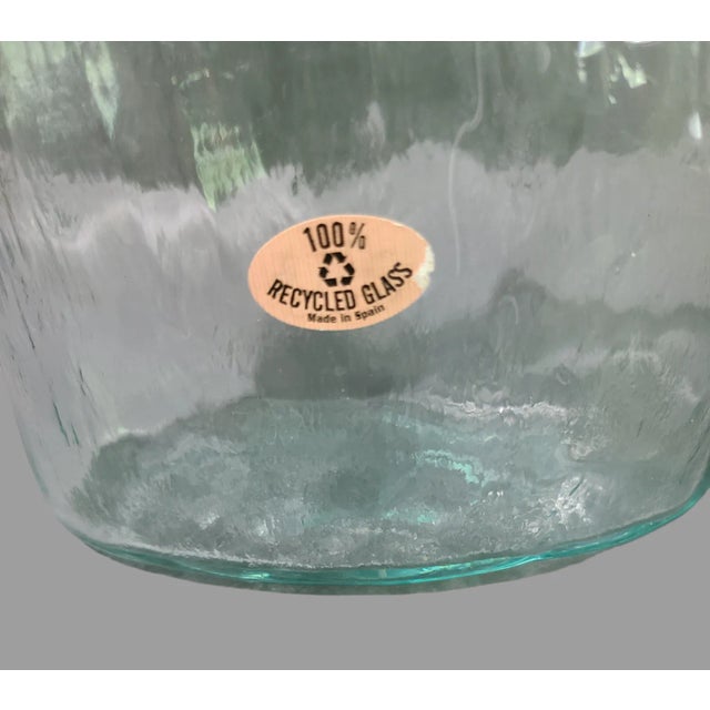 Add a touch of elegance to your decor with this exquisite San Miguel Vidrios Spain vase. Crafted from 100% recycled glass,...