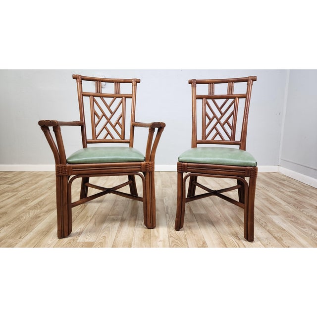 Sweet set of Chinese Chippendale Rattan Chairs from the 1970s or 1980s. Original untouched condition! Strong Sturdy Set in...