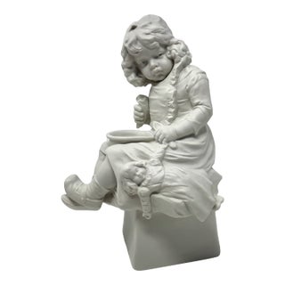 Antique German Bisque Figure of Unhappy Young Girl With Empty Bowl and Doll For Sale