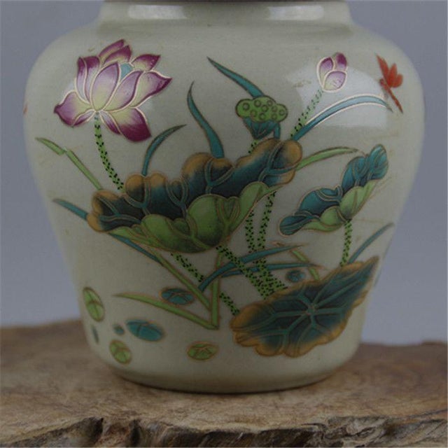 Add a touch of traditional elegance to your home decor with this charming ceramic ginger jar. This beautiful piece...