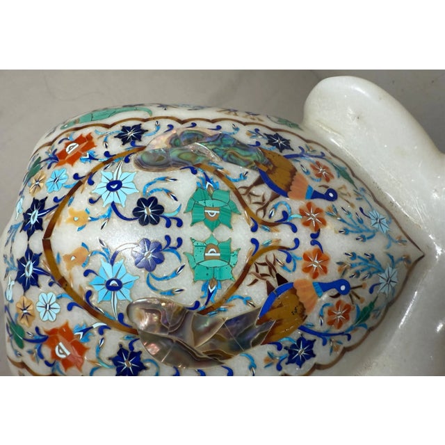 This vintage inlaid white marble marquetry stone elephant sculpture is a unique collectible that showcases intricate...