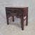 A beautiful and unique antique Chinese Qing dynasty deep red lacquer side table or ladies' desk, dating from the late...